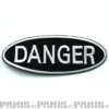 Danger - kangasmerkki